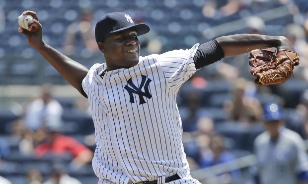 New York Yankees pitcher Michael Pineda (35) delivers against the Kansas City Royals during the fir...