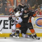 
              Anaheim Ducks left wing Matt Beleskey, right, checks Chicago Blackhawks center Antoine Vermette during the first period in Game 7 of the Western Conference final of the NHL hockey Stanley Cup playoffs in Anaheim, Calif., Saturday, May 30, 2015.  (AP Photo/Mark J. Terrill)
            