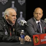 
              Chicago Blackhawks head coach Joel Quenneville, left, answers a question as general manger Stan Bowman looks on during media day for the NHL hockey's Stanley Cup Finals, Tuesday, June 2, 2015, in Tampa, Fla. The Blackhawks take on the Tampa Bay Lightning in Game 1 on Wednesday.  (AP Photo/Chris O'Meara)
            
