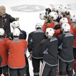 
              Chicago Blackhawks head coach Joel Quenneville, top left, directs the team during NHL hockey practice for the Stanley Cup Finals, Tuesday, June 2, 2015, in Tampa, Fla. The Blackhawks take on the Tampa Bay Lightning in Game 1 on Wednesday.  (AP Photo/Chris O'Meara)
            
