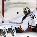 
              Anaheim Ducks goalie Frederik Andersen looks at the goal by Chicago Blackhawks center Antoine Vermette during the second overtime in Game 4 of the Western Conference finals of the NHL hockey Stanley Cup playoffs, Saturday, May 23, 2015, in Chicago. The Blackhawks won 5-4. (AP Photo/Charles Rex Arbogast)
            