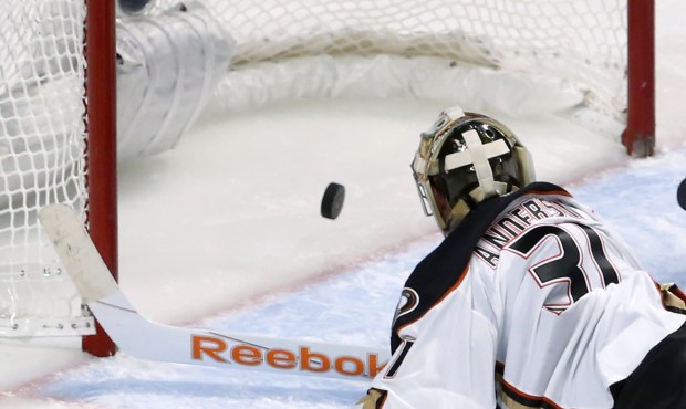 Anaheim Ducks goalie Frederik Andersen looks at the goal by Chicago Blackhawks center Antoine Verme...