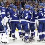 
              Members of the Tampa Bay Lightning celebrate after defeating the Montreal Canadiens 4-1 during Game 6 of a second-round NHL Stanley Cup hockey playoff series Tuesday, May 12, 2015, in Tampa, Fla. (AP Photo/Chris O'Meara)
            