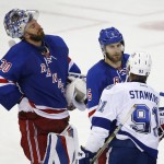 
              New York Rangers goalie Henrik Lundqvist (30) reacts as defenseman Dan Girardi (5) congratulates Tampa Bay Lightning center Steven Stamkos (91) after the Lightning beat the Rangers 2-0 in Game 7 of the Eastern Conference final during the NHL hockey Stanley Cup playoffs, Friday, May 29, 2015, in New York. (AP Photo/Kathy Willens)
            