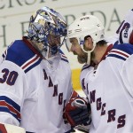 
              New York Rangers goalie Henrik Lundqvist (30), of Sweden, and defenseman Dan Boyle (22) congratulate each other after the Rangers defeated the Tampa Bay Lightning 5-1 in Game 4 of the Eastern Conference finals of the NHL hockey Stanley Cup playoffs, Friday, May 22, 2015, in Tampa, Fla. (AP Photo/Phelan M. Ebenhack)
            