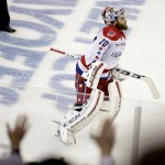 
              Washington Capitals goalie Braden Holtby skates off the ice after the New York Rangers won 2-1 in overtime during Game 7 of the Eastern Conference semifinals in the NHL hockey Stanley Cup playoffs Wednesday, May 13, 2015, in New York. (AP Photo/Frank Franklin II)
            