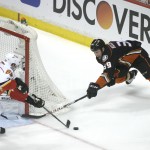 
              Anaheim Ducks' Matt Beleskey, right, is defended by Calgary Flames' Sam Bennett during the first period of Game 2 in the second round of the NHL Stanley Cup hockey playoffs, Sunday, May 3, 2015, in Anaheim, Calif. (AP Photo/Jae C. Hong)
            