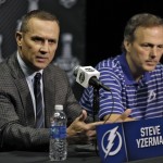 
              Tampa Bay Lightning general manager Steve Yzerman, left, and head coach Jon Cooper answer questions during media day for the NHL Hockey Stanley Cup Finals, Tuesday, June 2, 2015, in Tampa, Fla. The Lightning will take on the Chicago Blackhawks in Game 1 on Wednesday.  (AP Photo/Chris O'Meara)
            
