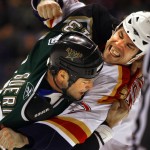
              FILE - In this Dec. 7, 2005, file photo, Florida Panthers' Steve Montador, right, fights with Dallas Stars' Bill Guerin (13) during the first period of an NHL hockey game in Dallas. An autopsy of Montador's brain shows the former NHL defenseman had degenerative brain disease.  The 35-year-old Montador, who had multiple concussions during his career with six NHL teams, died in February at home in Mississauga, Ontario.  (AP Photo/Matt Slocum, File)
            