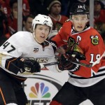 
              FILE - In this Jan. 17, 2014, file photo, Chicago Blackhawks' Jonathan Toews, right, and Anaheim Ducks' Hampus Lindholm watch the puck during the second period of an NHL hockey game in Chicago. Anaheim and Chicago will meet in the 2015 Western Conference Finals.  (AP Photo/Nam Y. Huh, File)
            