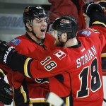 
              Calgary Flames' Michael Ferland, left, celebrates his goal against the Anaheim Ducks with teammate Matt Stajan during the first period of Game 4 of NHL hockey second-round playoff action in Calgary, Alberta, Friday, May 8, 2015. (Jeff McIntosh/The Canadian Press via AP) MANDATORY CREDIT
            