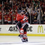 
              Chicago Blackhawks defenseman Brent Seabrook, right, celebrates his goal against the Anaheim Ducks with Jonathan Toews during the third period in Game 4 of the Western Conference finals of the NHL hockey Stanley Cup playoffs, Saturday, May 23, 2015, in Chicago. (AP Photo/Nam Y. Huh)
            