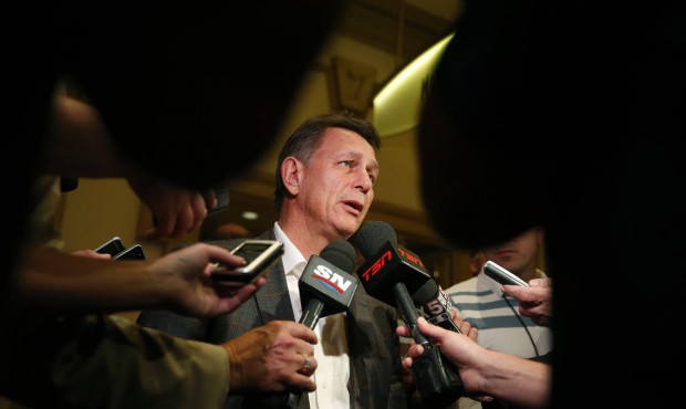 Detroit Red Wings general manager Ken Holland speaks with the media after a meeting of NHL hockey g...