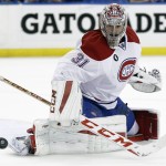 
              Montreal Canadiens goalie Carey Price (31) makes a save on a shot by the Tampa Bay Lightning during the second period of Game 6 of a second-round NHL Stanley Cup hockey playoff series Tuesday, May 12, 2015, in Tampa, Fla. (AP Photo/Chris O'Meara)
            