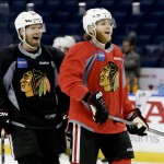 
              Chicago Blackhawks defenseman Kimmo Timonen, left, right wing Patrick Kane laugh during practice at the NHL hockey Stanley Cup Final, Friday, June 5, 2015, in Tampa, Fla. The Chicago Blackhawks lead the best-of-seven games series against the Tampa Bay Lightning 1-0. Game 2 is scheduled for Saturday night. (AP Photo/Chris Carlson)
            
