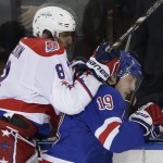 
              Washington Capitals left wing Alex Ovechkin (8) collides with New York Rangers right wing Jesper Fast (19) during the second period of Game 7 of the Eastern Conference semifinals during the NHL hockey Stanley Cup playoffs Wednesday, May 13, 2015, in New York. (AP Photo/Frank Franklin II)
            