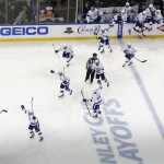 
              The Tampa Bay Lightning celebrate their 2-0 win over the New York Rangers in Game 7 of the Eastern Conference final during the NHL hockey Stanley Cup playoffs, Friday, May 29, 2015, in New York.  (AP Photo/Julie Jacobson)
            