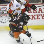 
              Calgary Flames' David Wolf, top, and Anaheim Ducks' Kyle Palmieri fight for the puck during the first period of Game 2 in the second round of the NHL Stanley Cup hockey playoffs, Sunday, May 3, 2015, in Anaheim, Calif. (AP Photo/Jae C. Hong)
            
