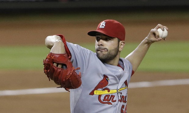 St. Louis Cardinals’ Jaime Garcia delivers a pitch during the third inning of a baseball game...