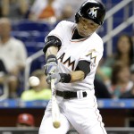 
              Miami Marlins' Ichiro Suzuki, of Japan, bats during the sixth inning of a baseball game against the St. Louis Cardinals, Wednesday, June 24, 2015, in Miami. Suzuki grounded out. (AP Photo/Wilfredo Lee)
            