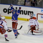 
              New York Rangers right wing Jesper Fast (19) celebrates a goal by the Rangers against Washington Capitals goalie Braden Holtby (70) during the third period of Game 1 in the second round of the NHL Stanley Cup hockey playoffs Thursday, April 30, 2015, in New York. (AP Photo/Frank Franklin II)
            