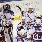 
              The New York Rangers celebrate their 7-3 win over the Tampa Bay Lightning in Game 6 of the Eastern Conference finals during the NHL hockey Stanley Cup playoffs, Tuesday, May 26, 2015, in Tampa, Fla. (AP Photo/Phelan M. Ebenhack)
            