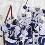 
              The Tampa Bay Lightning celebrate their 2-0 win over the New York Rangers in Game 7 of the Eastern Conference final during the NHL hockey Stanley Cup playoffs, Friday, May 29, 2015, in New York.  (AP Photo/Julie Jacobson)
            