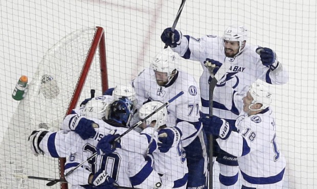 The Tampa Bay Lightning celebrate their 2-0 win over the New York Rangers in Game 7 of the Eastern ...