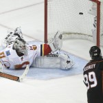 
              Anaheim Ducks' Matt Beleskey, right, scores against Calgary Flames goalie Karri Ramo, of Finland, during the first period of Game 2 in the second round of the NHL Stanley Cup hockey playoffs, Sunday, May 3, 2015, in Anaheim, Calif. (AP Photo/Jae C. Hong)
            