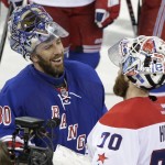 
              New York Rangers goalie Henrik Lundqvist (30) greets Washington Capitals goalie Braden Holtby (70) after the Rangers won 2-1 in overtime in Game 7 of the Eastern Conference semifinals during the NHL hockey Stanley Cup playoffs Wednesday, May 13, 2015, in New York. (AP Photo/Frank Franklin II)
            