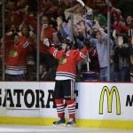 
              Chicago Blackhawks center Jonathan Toews celebrates his goal against the Anaheim Ducks during the third period in Game 4 of the Western Conference finals of the NHL hockey Stanley Cup playoffs, Saturday, May 23, 2015, in Chicago. (AP Photo/Nam Y. Huh)
            