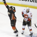 
              Anaheim Ducks' Patrick Maroon, left, celebrates his goal as he skates past Calgary Flames' Matt Stajan during the first period of Game 1 in the second round of the NHL Stanley Cup hockey playoffs, Thursday, April 30, 2015, in Anaheim, Calif. (AP Photo/Jae C. Hong)
            