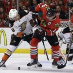 
              Anaheim Ducks right wing Jakob Silfverberg (33) and Chicago Blackhawks center Jonathan Toews (19) work for the puck during the second period in Game 4 of the Western Conference finals of the NHL hockey Stanley Cup playoffs, Saturday, May 23, 2015, in Chicago. (AP Photo/Nam Y. Huh)
            