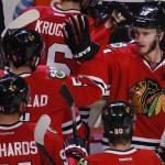 
              Chicago Blackhawks center Jonathan Toews, right, congratulates teammates after beating the Anaheim Ducks 5-2 in Game 6 of the Western Conference finals of the NHL hockey Stanley Cup playoffs, Wednesday, May 27, 2015, in Chicago. The Blackhawks won 5-2. (AP Photo/Charles Rex Arbogast)
            