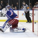 
              New York Rangers goalie Henrik Lundqvist (30) watches a shot by Tampa Bay Lightning left wing Ondrej Palat (18) fly into the net for a goal during the third period of Game 7 of the Eastern Conference final during the NHL hockey Stanley Cup playoffs, Friday, May 29, 2015, in New York.  (AP Photo/Frank Franklin)
            