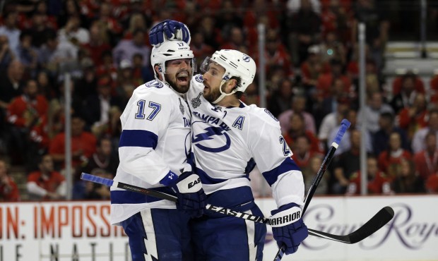 Tampa Bay Lightning’s Ryan Callahan, right, is congratulated by teammate Alex Killorn after s...