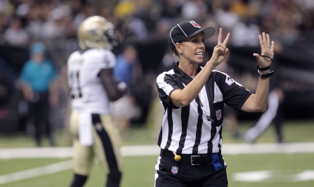 n FILE – In this Aug. 16, 2013, file photo, NFL referee Sarah Thomas works the game in the se...