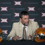
              Oklahoma State head coach Mike Gundy speaks during the 2015 Big 12 Conference Football Media Days Tuesday, July 21, 2015 in Dallas. (G.J. McCarthy/The Dallas Morning News via AP) MANDATORY CREDIT; MAGS OUT; TV OUT; INTERNET USE BY AP MEMBERS ONLY; NO SALES
            