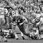 
              FILE - In this Oct. 23, 1967, file photo, San Francisco 49ers' John David Crow (44) grinds out 18 yards against the New Orleans Saints during the third quarter of an NFL football game at Kezar Stadium in San Francisco.  Crow, the bruising running back who won the 1957 Heisman Trophy with Texas A&M before a Pro Bowl career in the NFL, died Wednesday night, June 17, 2015, surrounded by his family, Texas A&M said.  He was 79. (AP Photo/File)
            