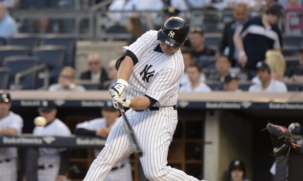 New York Yankees’ Brian McCann hits a two-run home run during the first inning of a baseball ...