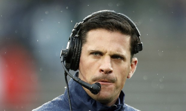 FILE- In this Nov. 1, 2014 file photo, Connecticut head coach Bob Diaco watches from the sideline d...