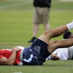 
              Tennessee Titans quarterback Marcus Mariota stretches during a rookie minicamp practice Friday, May 15, 2015, in Nashville, Tenn. (AP Photo/Mark Humphrey)
            
