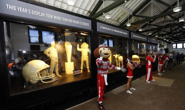 n Ohio State Buckeyes mascot Brutus claps his hands after the unveiling of the Ohio State fair butt...